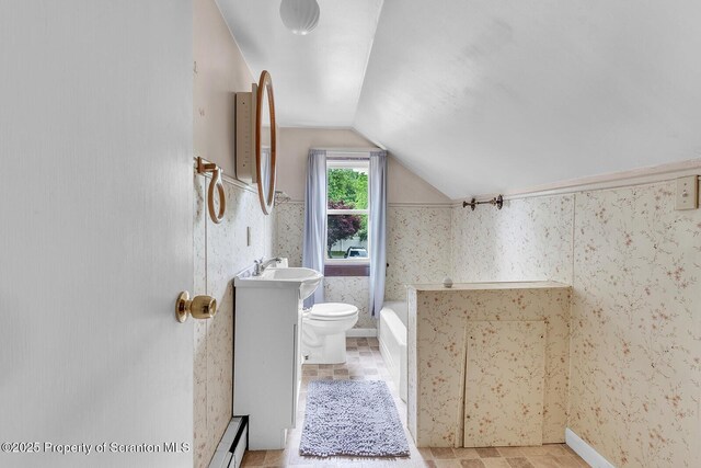 50 Humphrey St Unit 50-51, Old Forge, PA 18518 - bathroom featuring vaulted ceiling, a bathtub, vanity, and a baseboard heating unit