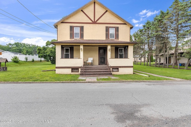 50 Humphrey St Unit 50-51, Old Forge, PA 18518 - view of front facade with stucco siding and covered porch