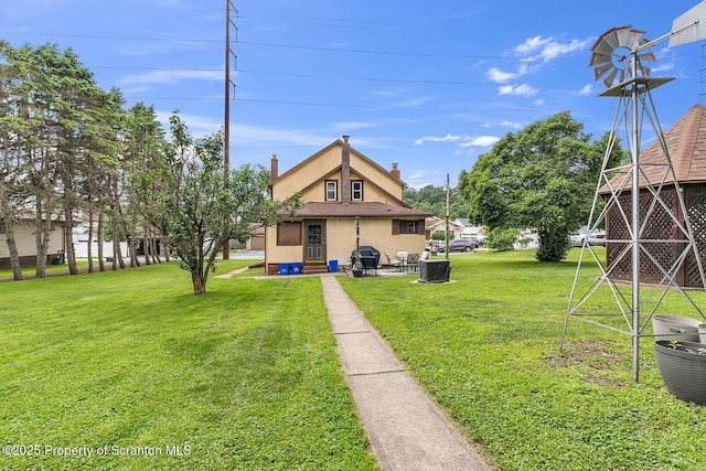 50 Humphrey St Unit 50-51, Old Forge, PA 18518 - view of green lawn featuring entry steps