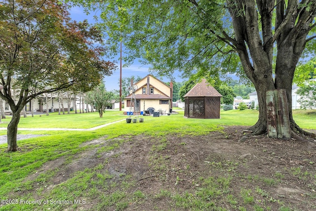 50 Humphrey St Unit 50-51, Old Forge, PA 18518 - view of green lawn with an outdoor structure