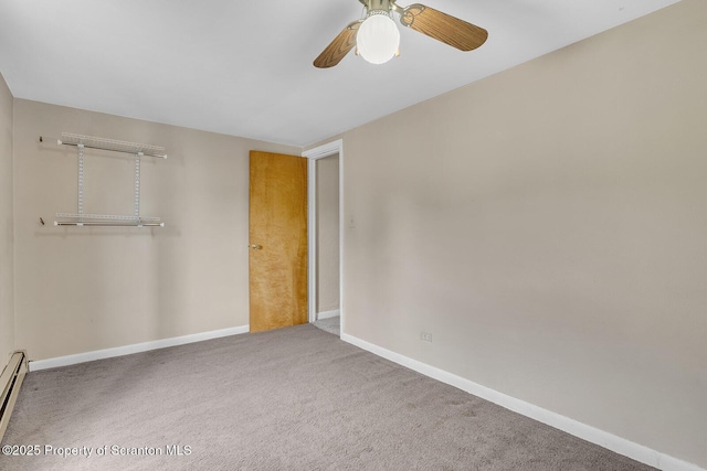 50 Humphrey St Unit 50-51, Old Forge, PA 18518 - unfurnished bedroom featuring carpet, a closet, a ceiling fan, and a baseboard heating unit