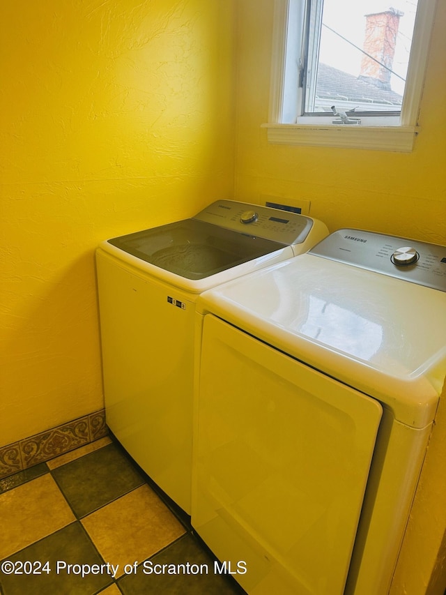 washroom featuring independent washer and dryer