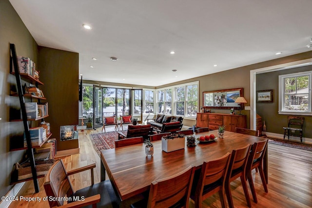 dining space featuring light hardwood / wood-style flooring