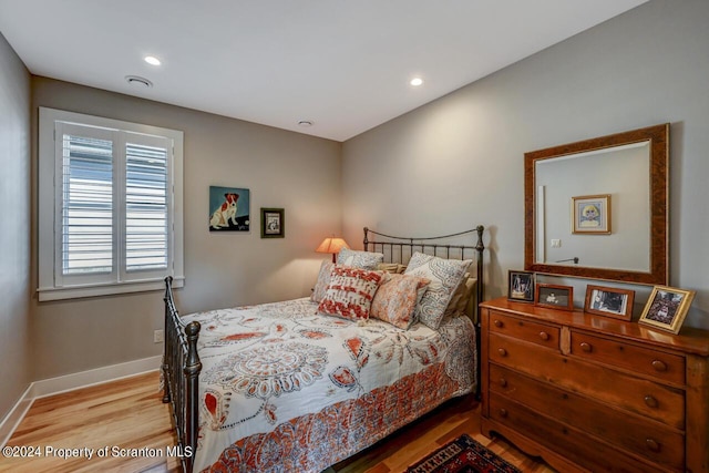 bedroom featuring light wood-type flooring