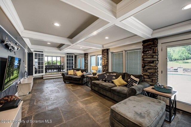 living room featuring beam ceiling, crown molding, and coffered ceiling