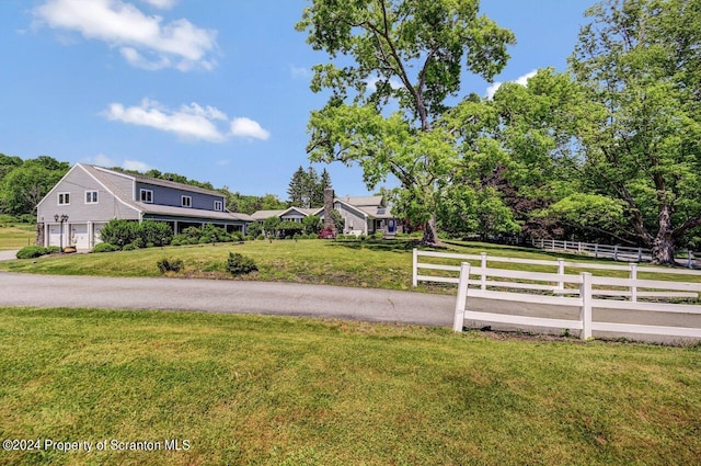 view of yard with a garage