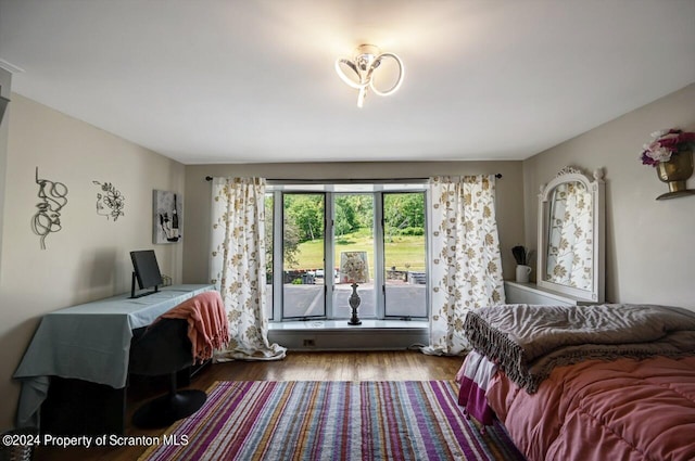 bedroom featuring hardwood / wood-style floors