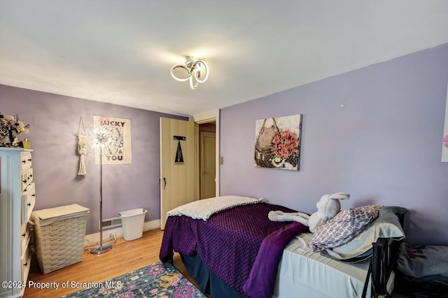 bedroom featuring light wood-type flooring