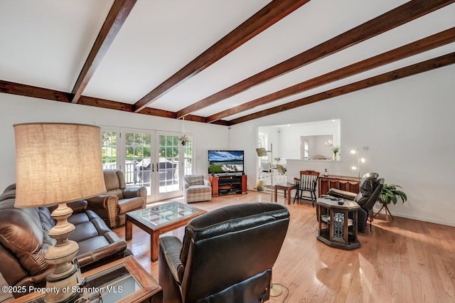 212 Lake Scranton Rd, Scranton, PA 18505 - living area with beam ceiling, light wood-style flooring, and french doors