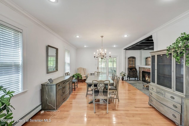 212 Lake Scranton Rd, Scranton, PA 18505 - dining space with a baseboard radiator, light wood finished floors, a chandelier, crown molding, and recessed lighting