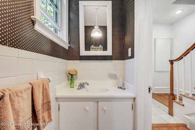 212 Lake Scranton Rd, Scranton, PA 18505 - bathroom with vanity, tile walls, and tile patterned floors