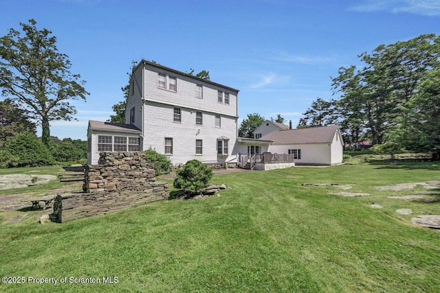 212 Lake Scranton Rd, Scranton, PA 18505 - rear view of property featuring a yard and a wooden deck