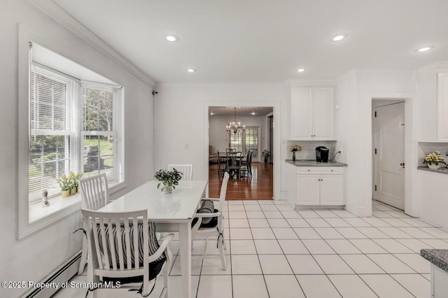 212 Lake Scranton Rd, Scranton, PA 18505 - dining area featuring baseboard heating, a chandelier, ornamental molding, recessed lighting, and light tile patterned floors