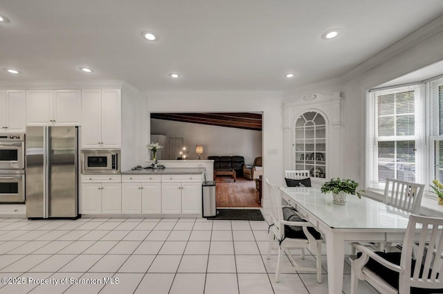 212 Lake Scranton Rd, Scranton, PA 18505 - kitchen with appliances with stainless steel finishes, crown molding, white cabinets, and recessed lighting