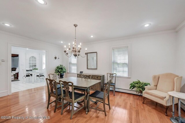 212 Lake Scranton Rd, Scranton, PA 18505 - dining space with a baseboard radiator, crown molding, a chandelier, light wood-style floors, and recessed lighting