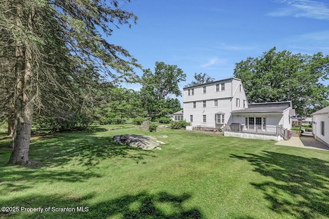 212 Lake Scranton Rd, Scranton, PA 18505 - view of green lawn with a wooden deck