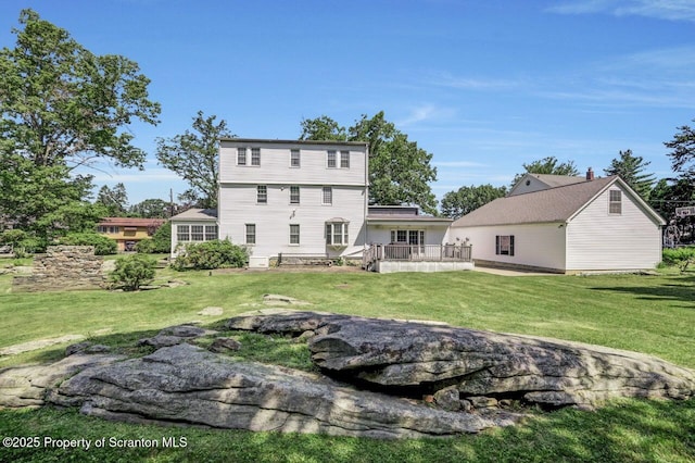212 Lake Scranton Rd, Scranton, PA 18505 - rear view of property featuring a yard and a deck