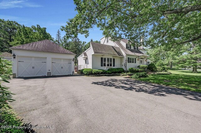 212 Lake Scranton Rd, Scranton, PA 18505 - view of front of home featuring an outbuilding, a detached garage, and a front lawn