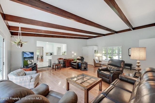212 Lake Scranton Rd, Scranton, PA 18505 - living room with beam ceiling and light wood-style floors