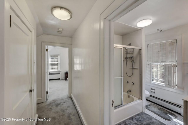 212 Lake Scranton Rd, Scranton, PA 18505 - bathroom featuring a baseboard radiator, healthy amount of natural light, and bath / shower combo with glass door