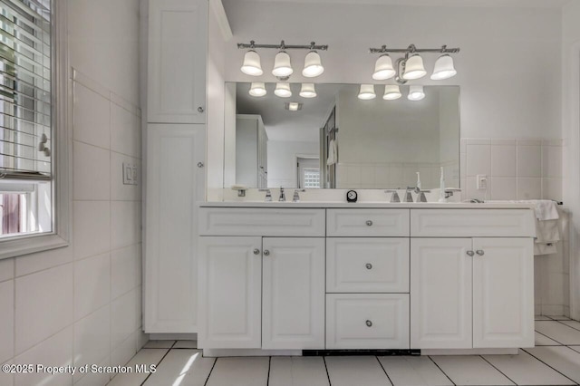 212 Lake Scranton Rd, Scranton, PA 18505 - full bath with tile walls, double vanity, and tile patterned floors