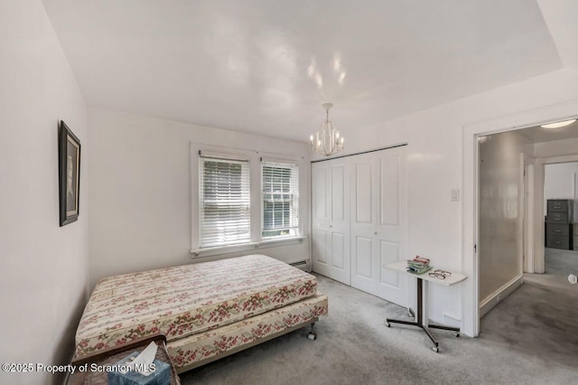 212 Lake Scranton Rd, Scranton, PA 18505 - bedroom with a chandelier, carpet, and a closet