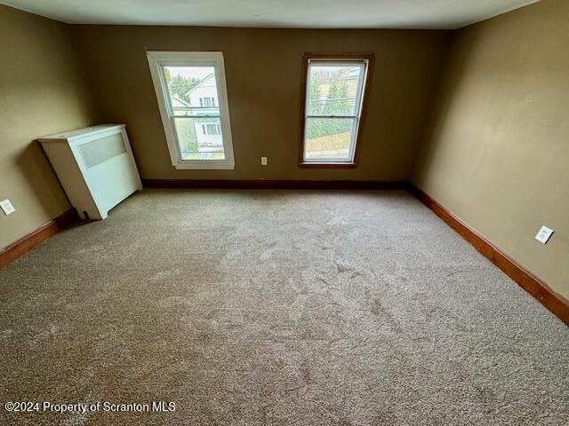 empty room with light carpet