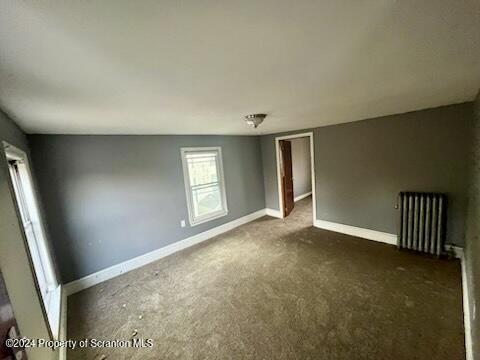 empty room with radiator heating unit