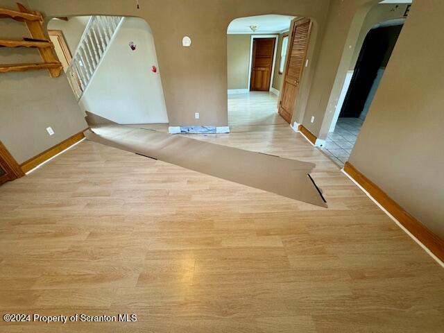 hallway featuring light hardwood / wood-style flooring