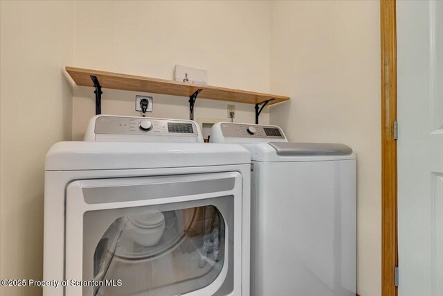 86 Paupack Point Rd, Hawley, PA 18428 - laundry area featuring separate washer and dryer