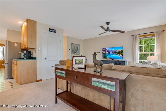 86 Paupack Point Rd, Hawley, PA 18428 - living room featuring ceiling fan and light colored carpet