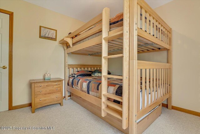 86 Paupack Point Rd, Hawley, PA 18428 - bedroom with carpet flooring and baseboards