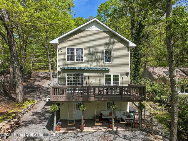 86 Paupack Point Rd, Hawley, PA 18428 - rear view of property with a deck, a patio, and an outdoor hangout area