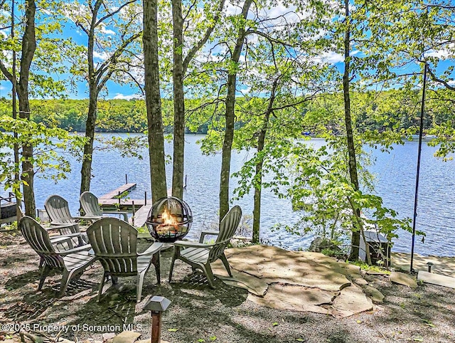 86 Paupack Point Rd, Hawley, PA 18428 - view of patio / terrace featuring a fire pit and a water view