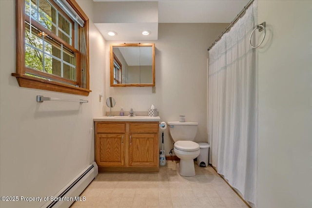86 Paupack Point Rd, Hawley, PA 18428 - bathroom featuring toilet, vanity, baseboard heating, recessed lighting, and a shower with curtain