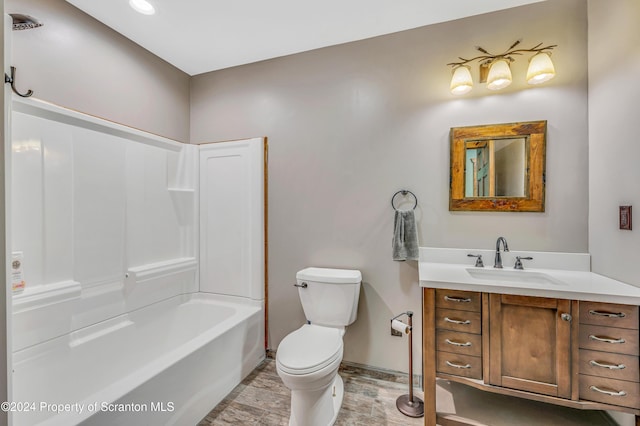 full bathroom featuring shower / tub combination, vanity, and toilet