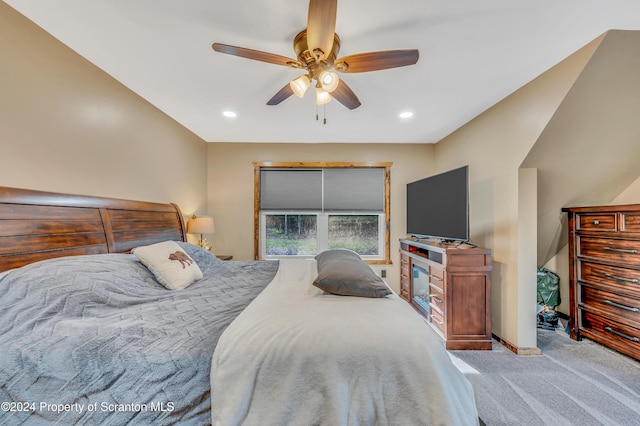 carpeted bedroom featuring ceiling fan