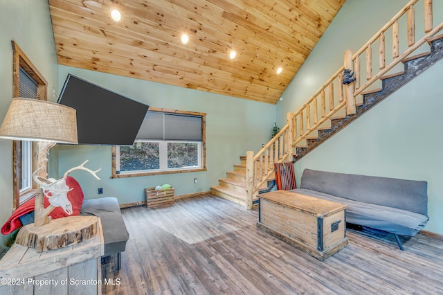 living room with hardwood / wood-style flooring, wood ceiling, and high vaulted ceiling