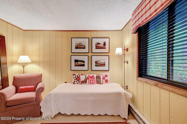 bedroom with ornamental molding, a textured ceiling, and wooden walls