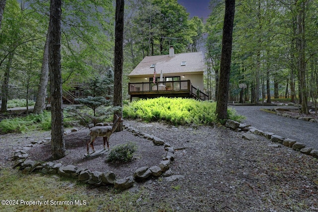 exterior space featuring a wooden deck