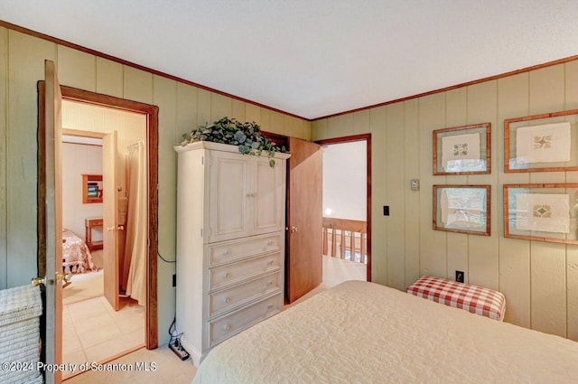 bedroom with crown molding