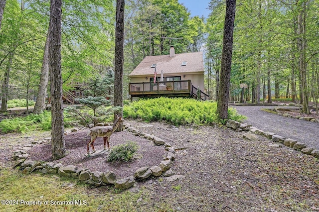 exterior space featuring a wooden deck