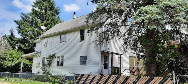 1809 Washburn St, Scranton, PA 18504 - view of home's exterior featuring a chimney