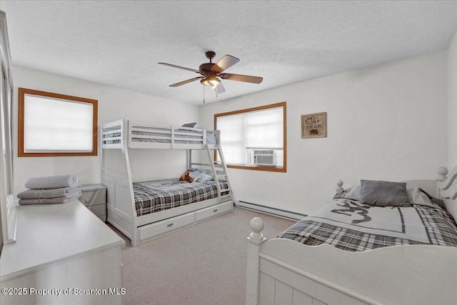 bedroom featuring a baseboard radiator, light carpet, ceiling fan, a textured ceiling, and cooling unit