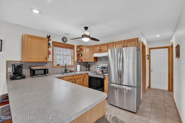 kitchen with under cabinet range hood, stainless steel appliances, a sink, light countertops, and open shelves