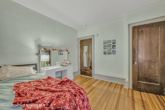 bedroom featuring wood-type flooring