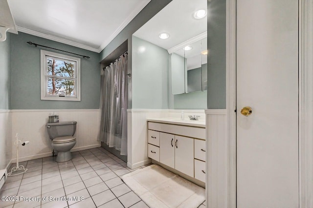 bathroom with toilet, crown molding, tile patterned floors, vanity, and a baseboard heating unit