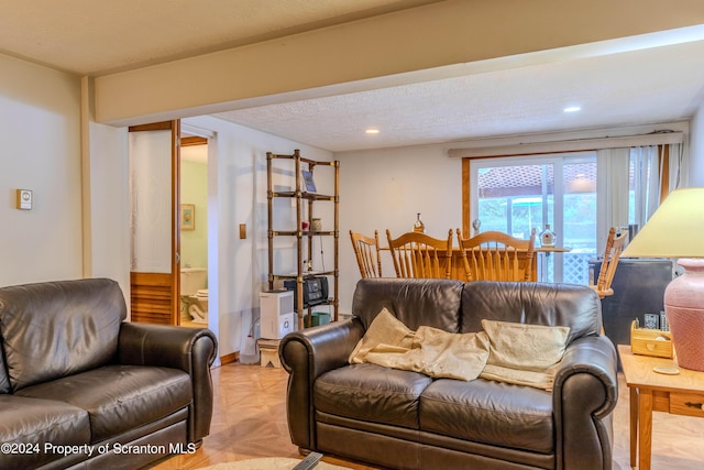 living room featuring light parquet floors