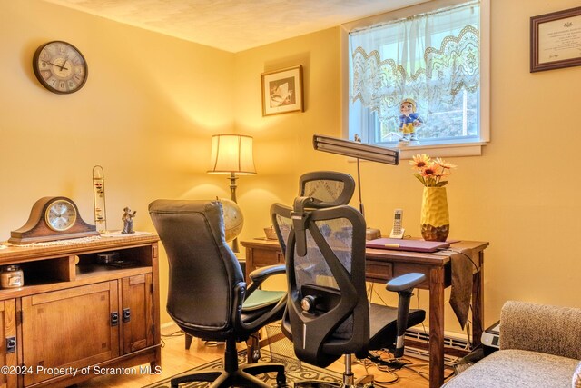 home office featuring light wood-type flooring