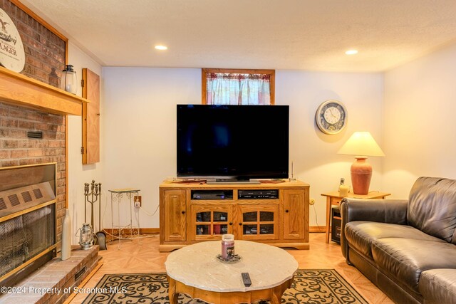 living room with a textured ceiling